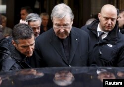 Australian Cardinal George Pell leaves at the end of a meeting with the victims of sex abuse, at the Quirinale hotel in Rome, Italy, March 3, 2016.