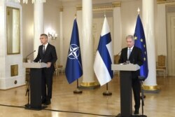 FILE - NATO chief Jens Stoltenberg and Finnish President Sauli Niinistö hold a news conference in Helsinki, Finland, Oct. 25, 2021. Niinistö says his country has the right to join NATO, a flat rejection of Russia's demand that the alliance admit no new members.