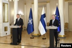 FILE - NATO chief Jens Stoltenberg and Finnish President Sauli Niinistö hold a news conference in Helsinki, Finland, Oct. 25, 2021. Niinistö says his country has the right to join NATO, a flat rejection of Russia's demand that the alliance admit no new members.