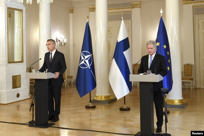 FILE - NATO chief Jens Stoltenberg and Finnish President Sauli Niinistö hold a news conference in Helsinki, Finland, Oct. 25, 2021. Niinistö says his country has the right to join NATO, a flat rejection of Russia's demand that the alliance admit no new members.