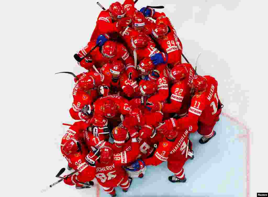 Russia&#39;s players celebrate after winning the Men&#39;s Ice Hockey World Championships bronze medal match between Russia and Czech Republic in Bratislava, Slovakia.