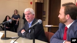 Michigan Gov. Rick Snyder, a Republican, speaks with reporters about his eight-year tenure and the Legislature’s lame-duck session on Dec. 11, 2018, at his offices in Lansing, Mich. 