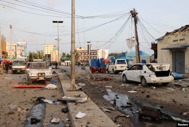 FILE - A general view shows the scene of an explosion in Mogadishu, Somalia, Nov. 9, 2018.