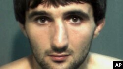 In this May 4, 2013 police mug provided by the Orange County Corrections Department in Orlando, Fla., shows Ibragim Todashev after his arrest for aggravated battery in Orlando.