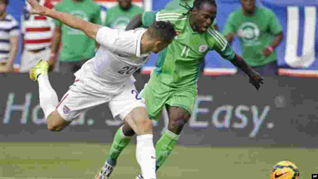 Nigeria's Victor Moses and United States's Geoff Cameron.