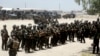 FILE - Iraq's elite counter-terrorism forces gather ahead of an operation to re-take the Islamic State-held City of Fallujah, outside Fallujah, Iraq, May 29, 2016. 