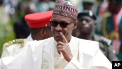 Nigerian President Muhammadu Buhari arrives for his Inauguration at the Eagle Square in Abuja, May 29, 2015.