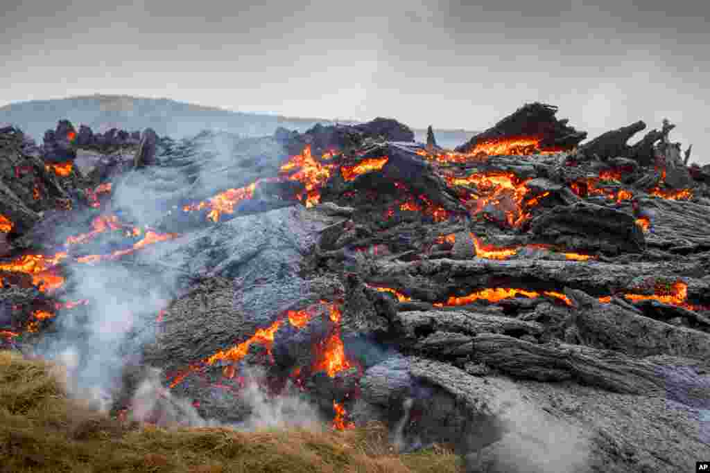 Lava flows from an eruption of a volcano on the Reykjanes Peninsula in southwestern Iceland, March 20, 2021.