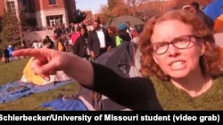 FILE - University of Missouri communications professor Melissa Click is seen in a screenshot from a video shot by University of Missouri student photographer Mark Schierbecker, telling the photographer he "needs to go" and can't videotape the student protesters,