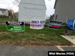 En Virginia carteles publicitarios en todos los barrios promueven a los candidatos republicanos y demócratas para gobernador, vicegobernador, fiscal estatal y delegados. Nov. 7, 2017