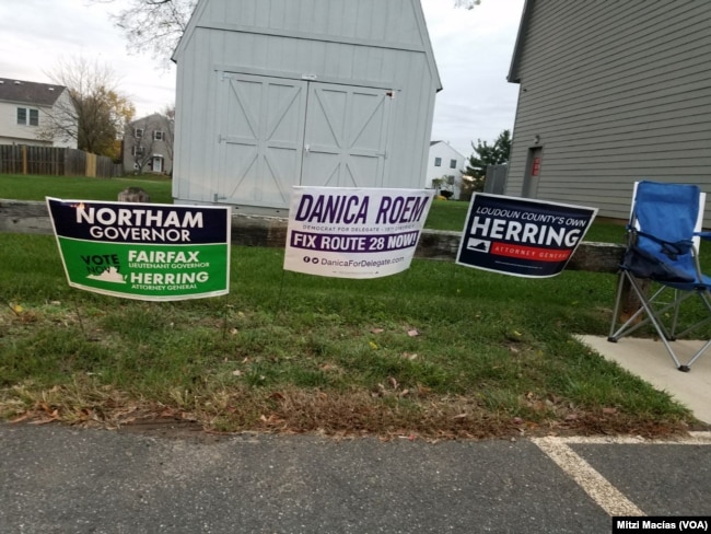 En Virginia carteles publicitarios en todos los barrios promueven a los candidatos republicanos y demócratas para gobernador, vicegobernador, fiscal estatal y delegados. Nov. 7, 2017