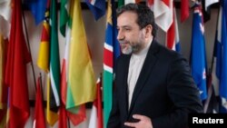 Iran's chief nuclear negotiator Abbas Araghchi leaves after giving a statement after meeting IAEA Director General Yukiya Amano (not pictured) at the IAEA headquarters in Vienna, Feb. 24, 2015. 