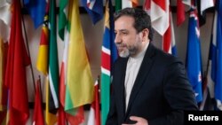 FILE - Iran's chief nuclear negotiator Abbas Araghchi leaves after giving a statement after meeting IAEA Director General Yukiya Amano (not pictured) at the IAEA headquarters in Vienna, Feb. 24, 2015. 