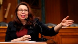 FILE - Sen. Tammy Duckworth, D-Ill., speaks on Capitol Hill, in Washington, Feb. 14, 2018.