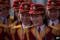 Members of the North Korea cheering group gather before a welcome ceremony inside the Gangneung Olympic Village prior to the 2018 Winter Olympics in Gangneung, South Korea, Feb. 8, 2018.