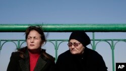 Christian women who fled el-Arish in Sinai, due to fighting, rest at a guest house, in Ismailia, east of Cairo, Egypt, Feb. 26, 2017.