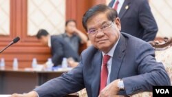 FILE: Minister of Interior Ministry Sar Kheng addresses the governors and police officials during an immigration report workshop on Friday, August 19, 2016 in Phnom Penh. (VOA Khmer) 