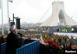 Iran's President Hassan Rouhani speaks during a ceremony to mark the 40th anniversary of the Islamic Revolution in Tehran, Iran, Feb. 11, 2019.