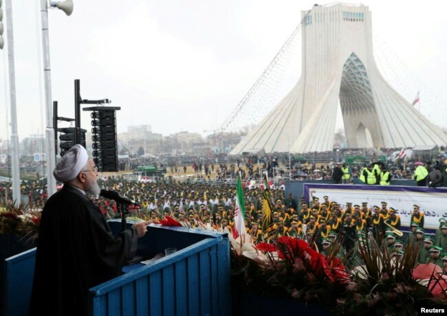 Iran's President Hassan Rouhani speaks during a ceremony to mark the 40th anniversary of the Islamic Revolution in Tehran, Iran, Feb. 11, 2019.