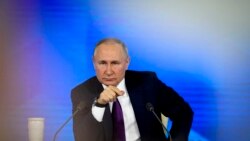 Vladimir Putin attends his annual news conference in Moscow, Dec. 23, 2021. The Russian President has urged the West to "immediately" meet Russia's demand for security guarantees.