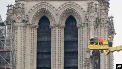 Notre Dame Cathedral gets new golden rooster weathervane