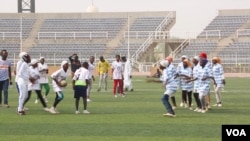 These female rugby players, a rare sight in Nigeria, are among the only two all-girl teams in the northern Nigerian state of Kano. They competed at the Second Annual Kano Youth Rugby Championships on Feb. 16, 2017. (VOA / C. Oduah)