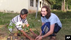 Erica Herrmann, right, is among the first group of 29 US volunteers to join the Peace Corps mission to Cambodia. 