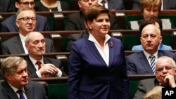 Beata Szydlo, candidate for prime minister from Law and Justice party, attends the inaugural session of the new parliament Nov. 12, 2015, in Warsaw, Poland.