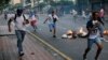 Venezuelan Soldiers, Students Face Off at Anti-Maduro Rallies