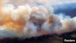 Smoke billows from the wildfires in Fort McMurray, Alberta, Canada in this image posted on twitter May 5, 2016.