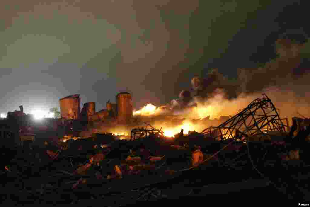 The remains of a fertilizer plant burn after an explosion at the plant in the town of West, near Waco, Texas, USA. The deadly explosion ripped through the fertilizer plant, injuring more than 100 people, leveling dozens of homes and damaging other buildings including a school and nursing home, authorities said.