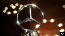 FILE - The hood ornament of a Mercedes vehicle is photographed during an annual press conference of Daimler AG in Stuttgart, Germany.