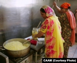 Members of the Sikh Temple in Oak Creek, Wisconsin, prepare a communal meal for the community.