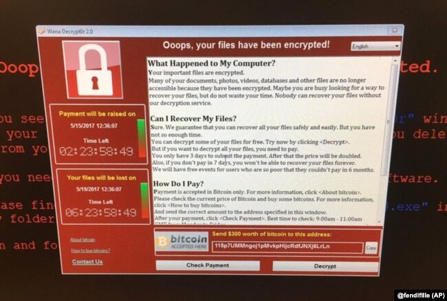社交媒体上贴出的照片显示受到勒索软件入侵的电脑屏幕上出现的英文信息：“哎哟，你的文件被加密了！”黑客索要价值300美元的比特币，这是一种匿名的网络货币。