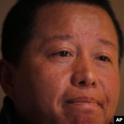 Gao Zhisheng ponders during his first meeting with the media since he briefly resurfaced in Beijing, April 7, 2010. His family has not heard from him since.