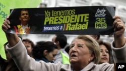 A supporter of Ecuador's President Rafael Correa celebrates his election victory in Quito, Ecuador, February 17, 2013.