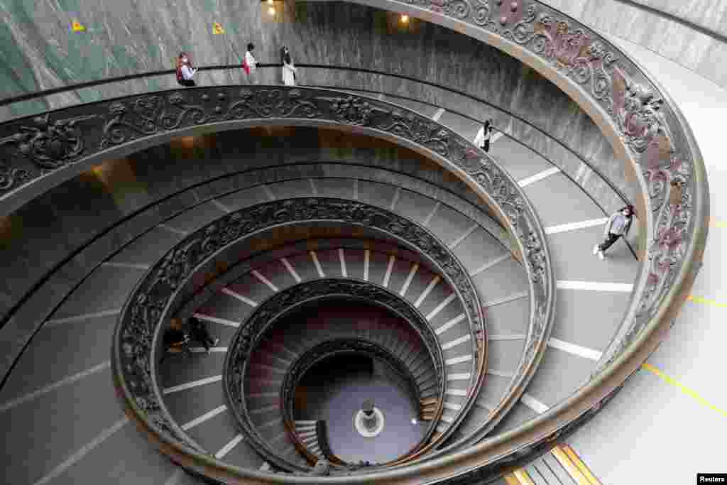 People visit the Vatican Museums at the Vatican on the day of its reopening after weeks of closure, as Italy eases COVID-19 restrictions.