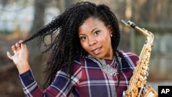 Saxophonist Tia Fuller poses for a photo session in Piscataway, N.J., Jan. 6, 2019.