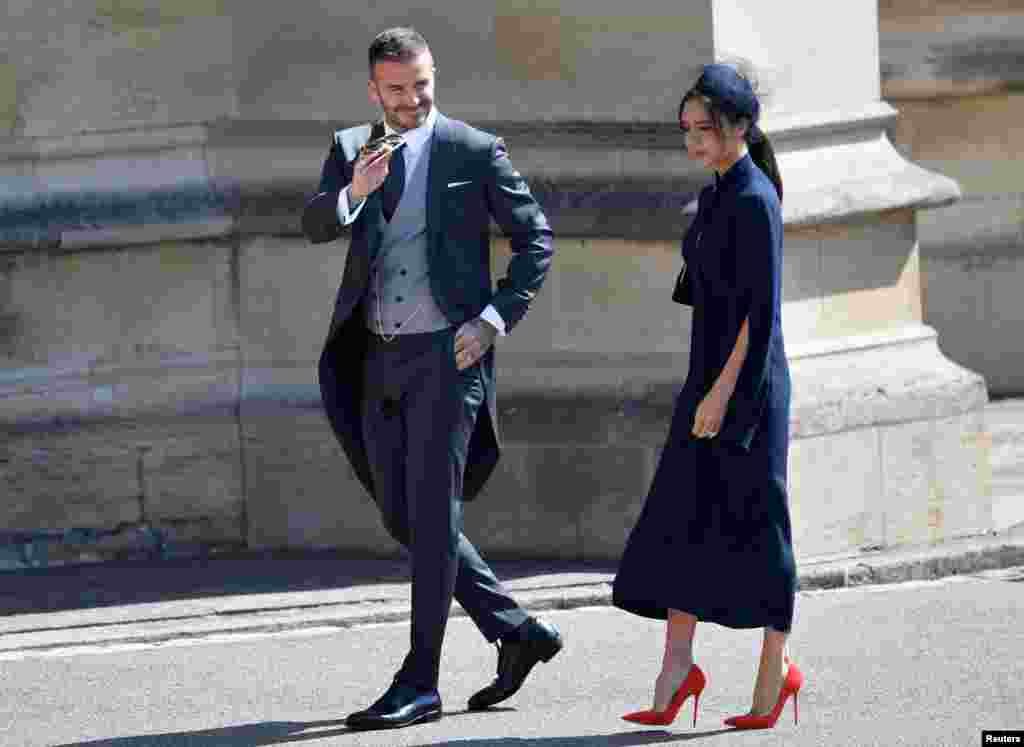 David and Victoria Beckham arrive to the wedding of Britain's Prince Harry to Meghan Markle in Windsor, Britain, May 19, 2018. 