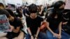 Pro-Democracy Protesters Block Hong Kong Airport, Flights Cancelled
