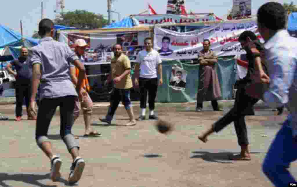 A street football match at the Rabaa al Adaweya encampment, Cairo, August 12, 2013. (E. Arrott/VOA 