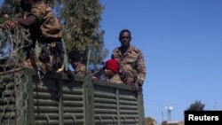Ethiopian soldiers ride on a truck near the town of Adigrat, Tigray region, Ethiopia. (March 18, 2021)
