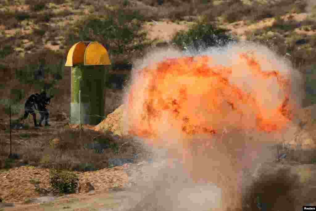 Palestinian militants take part in a military exercise in Rafah, southern Gaza Strip.