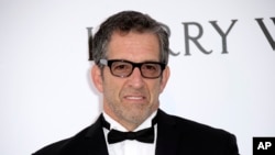 FILE - Designer Kenneth Cole, pictured at the amfAR Cinema Against AIDS benefit at the Cannes international film festival, May 19, 2016, was one of the first celebrities to speak out publicly about HIV, which hit the fashion industry hard in the 1980s.