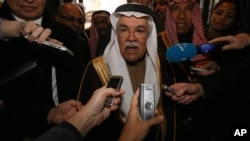 Saudi Arabia's Minister of Petroleum and Mineral Resources Ali Ibrahim Naimi speaks to journalists at a hotel in Vienna, Austria, Tuesday, Dec. 1, 2015. Saudi Arabia is OPEC's biggest oil producer.