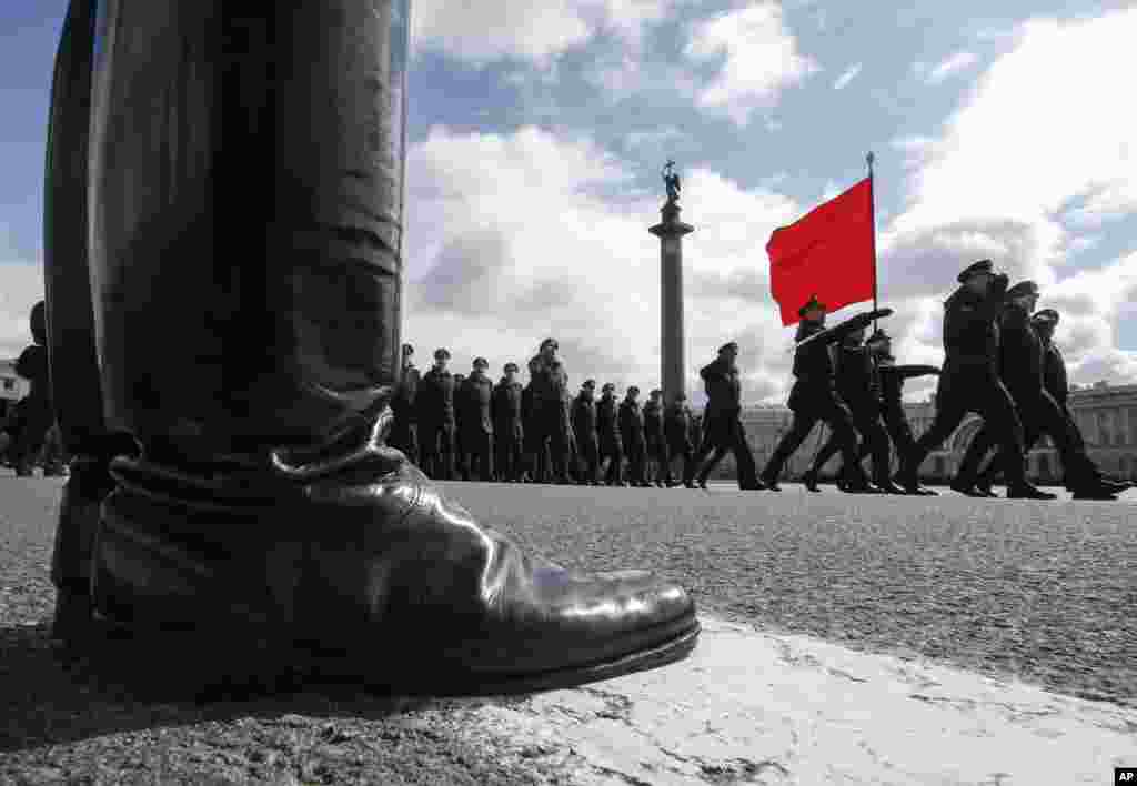 Russian soldiers march during a rehearsal for the Victory Day military parade which will take place at Dvortsovaya (Palace) Square on May 9 to celebrate 70 years after the victory in WWII, in St. Petersburg.