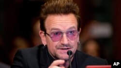 Irish rock star and activist Bono testifies on Capitol Hill in Washington before a Senate subcommittee hearing on the causes and consequences of violent extremism and the role of foreign assistance, April 12, 2016. 