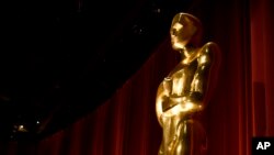 FILE - An Oscar statue is seen on stage at the 88th Academy Awards nomination ceremony in Beverly Hills, Calif., Jan. 14, 2016.