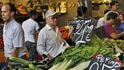 Cucumbers for sale at a market in Malaga, Spain, in late May. At first, German officials blamed Spanish cucumbers for the E. coli outbreak.