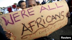 FILE - Migrants in Cape Town's Mannenberg community demonstrate against xenophobia.